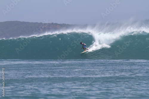 Indonesia, Lombok Island, surfing man