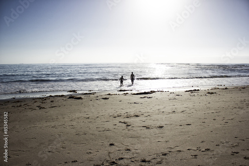 Namibia, Swakopmund, two boys playing at seafront