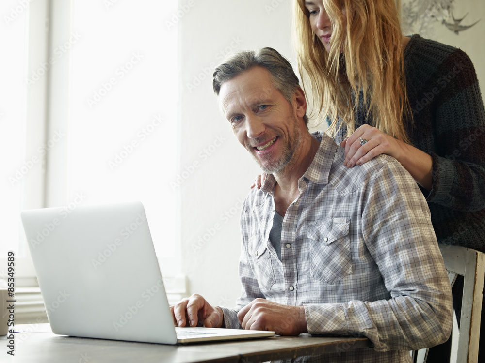 Germany, Cologne, Mature man and adult daughter surfing the web Germany, Cologne, Mature man and adult daughter surfing the web
