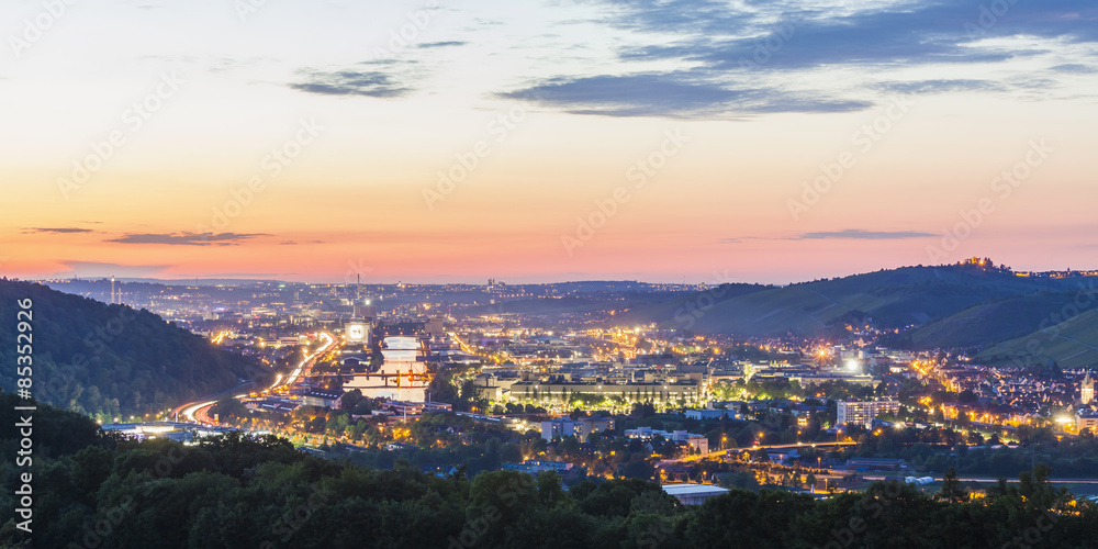 Germany, Baden-Wuerttemberg, Neckarvalley, River Neckar, View to Stuttgart with industrial area in the evening Germany, Baden-Wuerttemberg, Neckarvalley, River Neckar, View to Stuttgart with industrial area in the evening