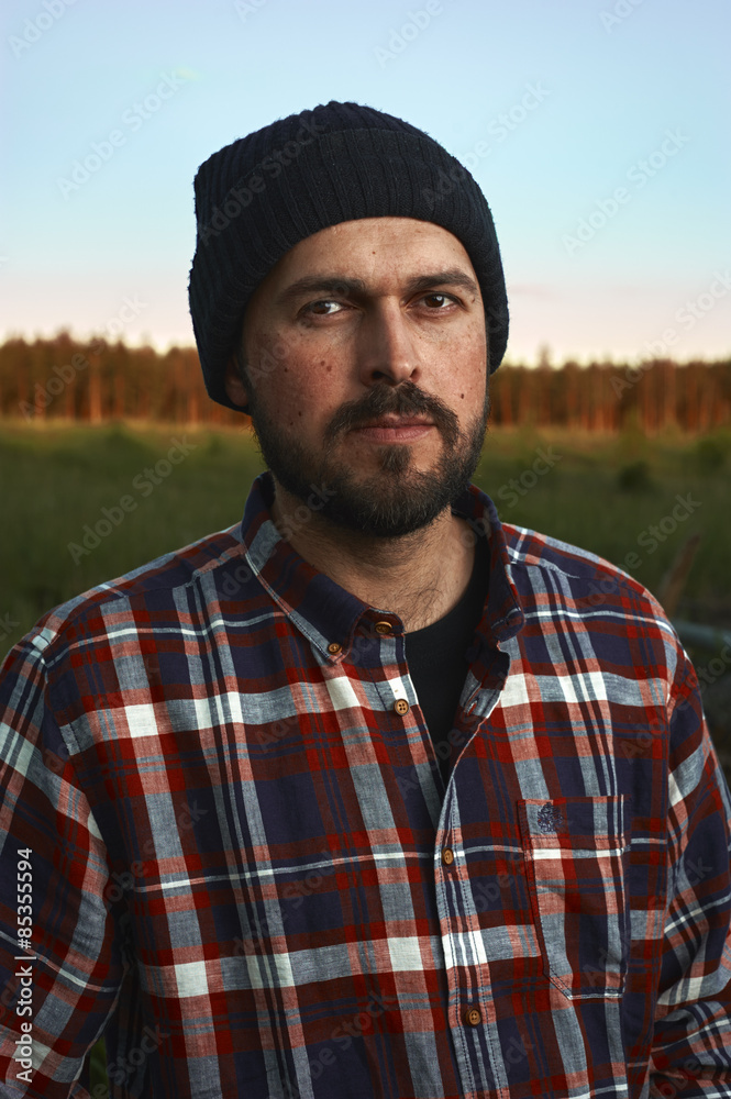 Portrait of bearded Lumberjack in a Field Portrait of bearded Lumberjack in a Field