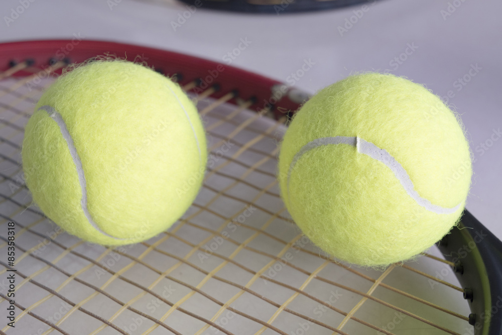 Tennis ball with racket