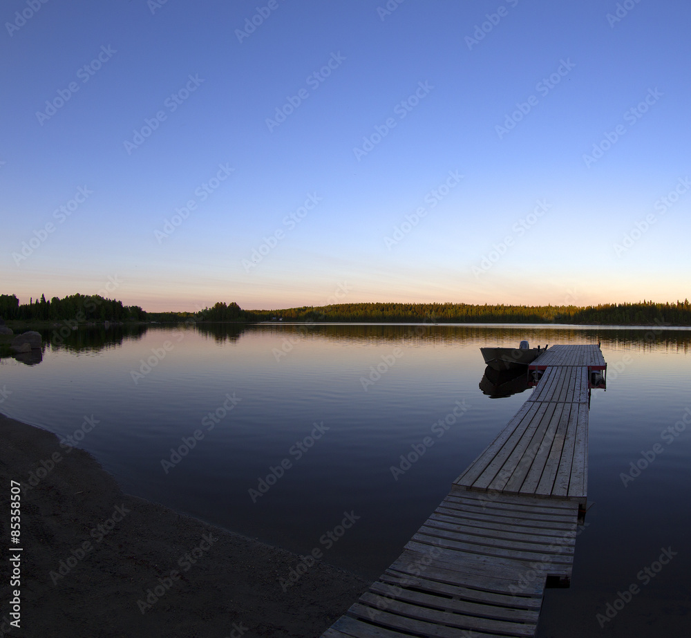 Sunset over wild canadian lake