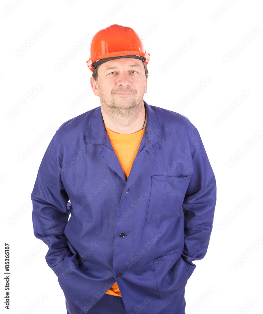 Man working clothes with arms in pockets. Man working clothes with arms in pockets.