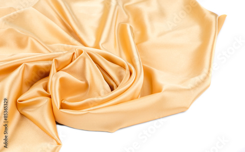 Closeup of golden silk cloth texture.