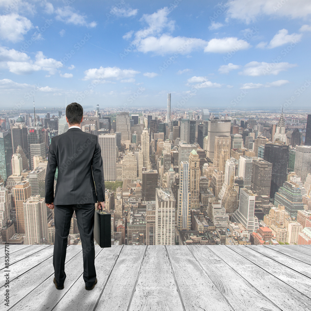 man looks over the city