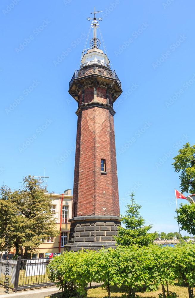 Fototapeta premium Lighthouse with time ball, Gdańsk New Port, near Westerplatte. Time ball drops by 12 with accuracy 1s for 200,000 years