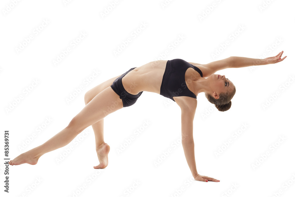 Image of cute female gymnast practicing in studio Image of cute female gymnast practicing in studio