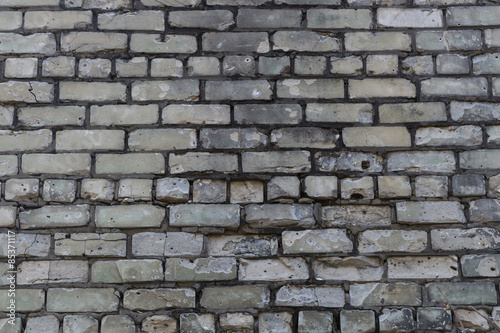 fragment of the old wall masonry with white sand-lime brick