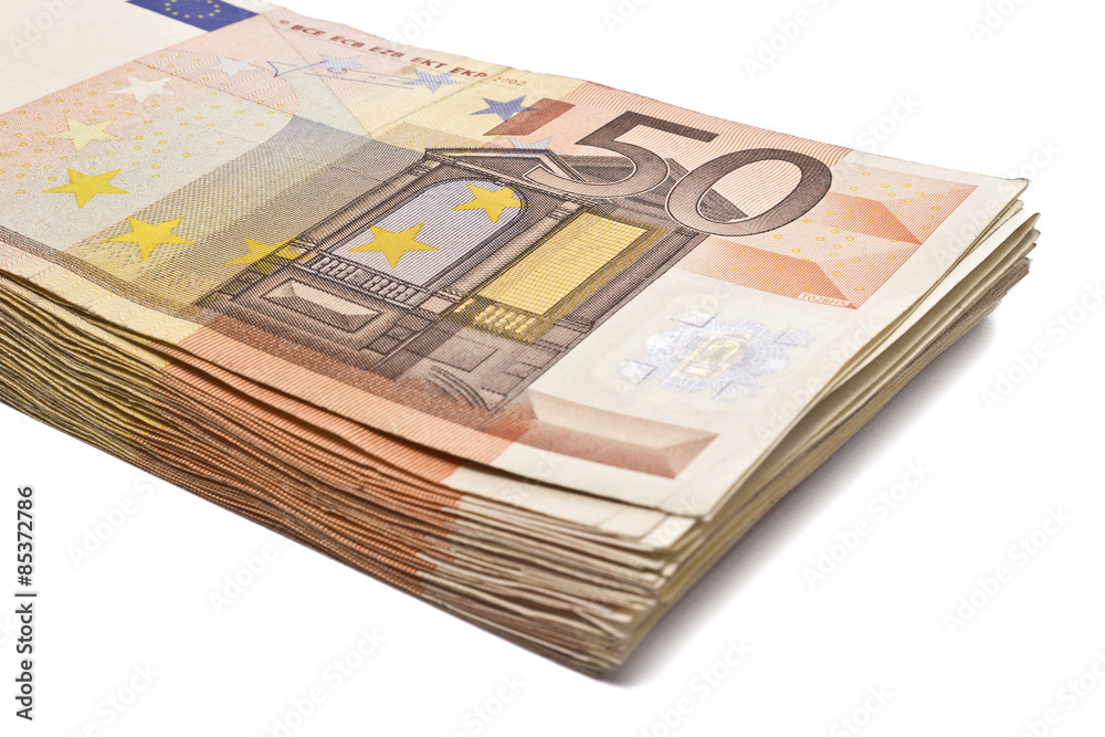 Pile of 50 real euro notes isolated on white Pile of 50 real euro notes isolated on white