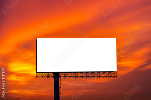 Blank billboard for new advertise on beautiful sunset sky background.