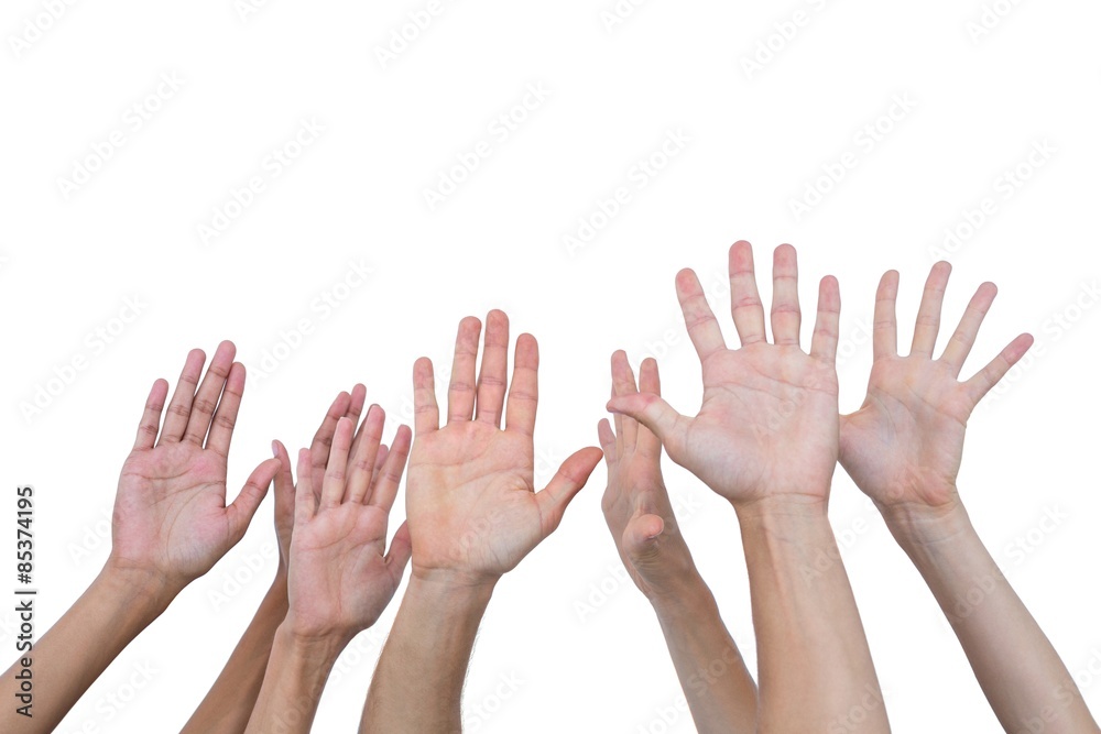 People raising their hands in the air People raising their hands in the air