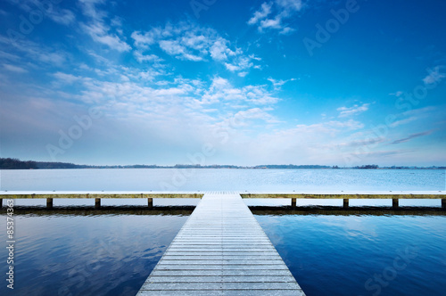 Принти на полотні A jetty on a cold winters morning walking along the jetty one must choose left o