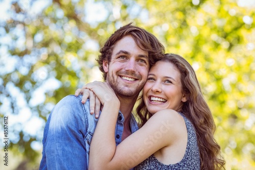 Hipster couple smiling at camera 