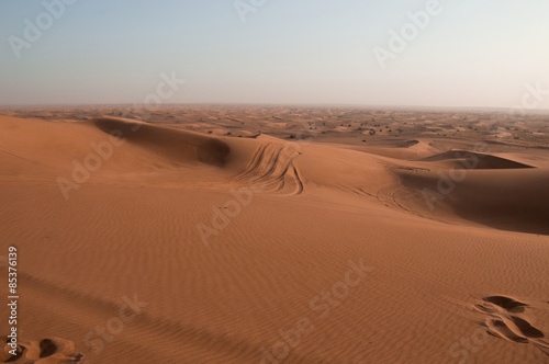 footprints on sand dune in Rub 'al Khali, United Arab Emirates