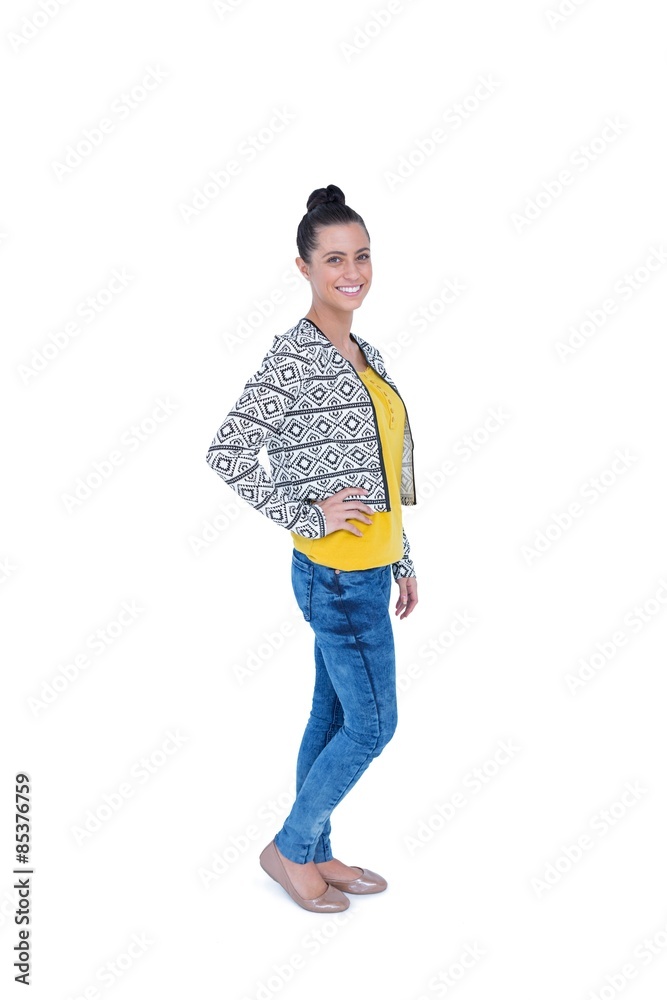 Pretty brunette posing in front on camera with hands on hip Pretty brunette posing in front on camera with hands on hip