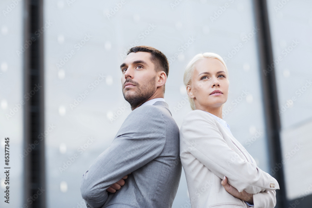businessman and businesswoman outdoors businessman and businesswoman outdoors
