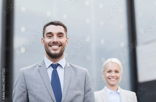 close up of smiling businessmen