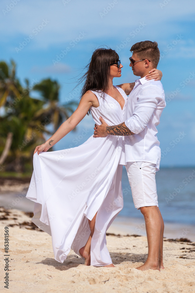 Beach couple walking on romantic travel. Beach couple walking on romantic travel.