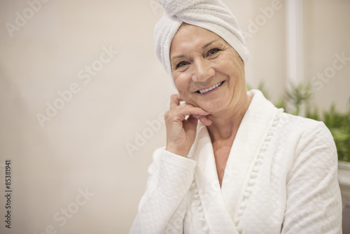Senior woman with towel on her hair