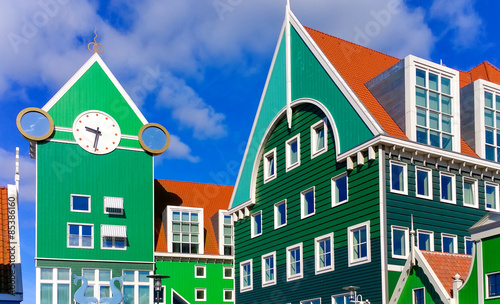 Traditional green, wooden houses in the city of Zaandam in the Netherlands, near the capital of Amsterdam. The picture was taken in june 2015.