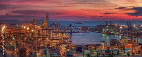 Canvas Print Logistic port with cargo ship