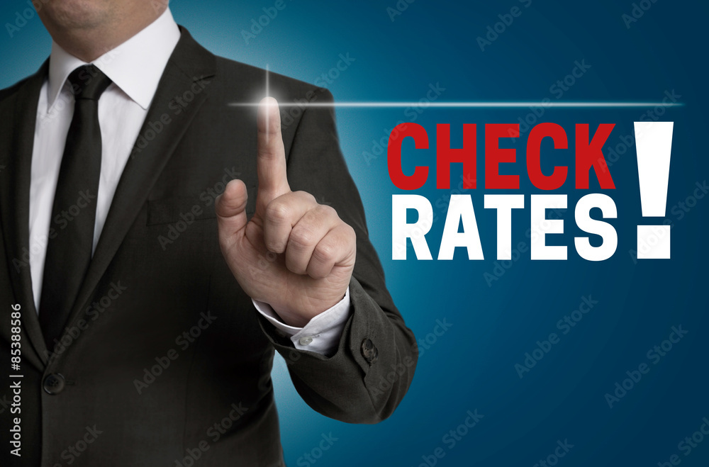 Check rates touchscreen is operated by businessman Check rates touchscreen is operated by businessman