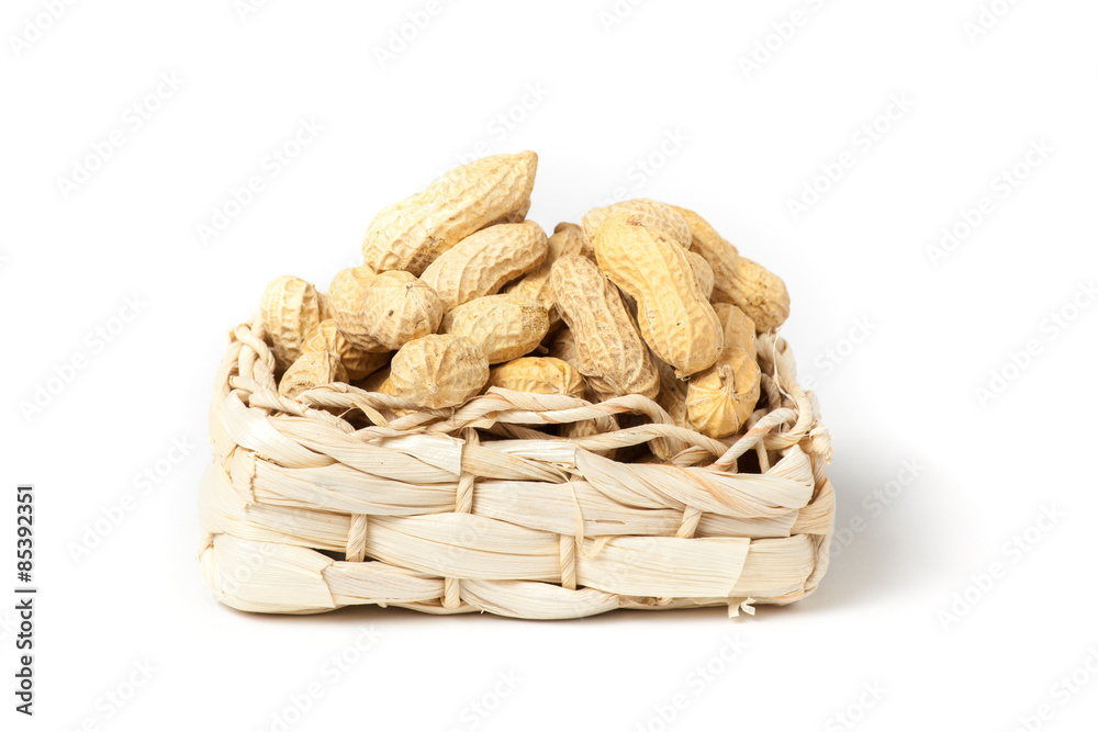 peanuts isolated in basket on white background peanuts isolated in basket on white background