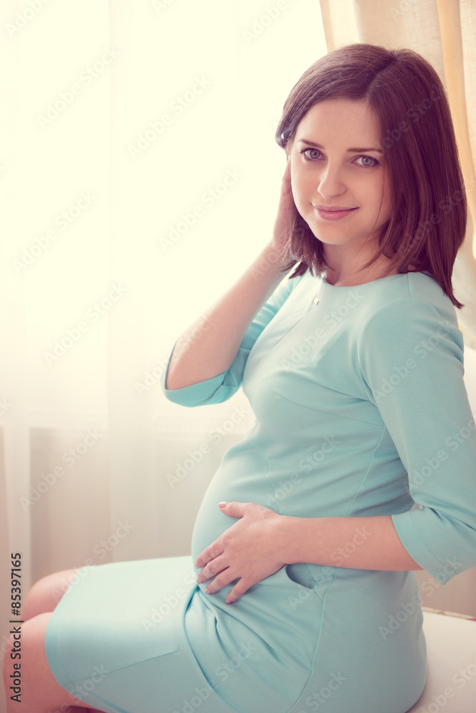 Portrait of pretty young pregnant woman Portrait of pretty young pregnant woman