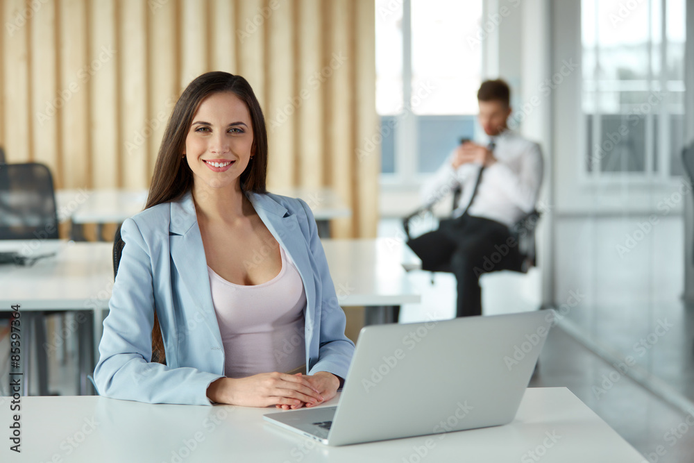 Happy Young Businesswoman at Office Happy Young Businesswoman at Office