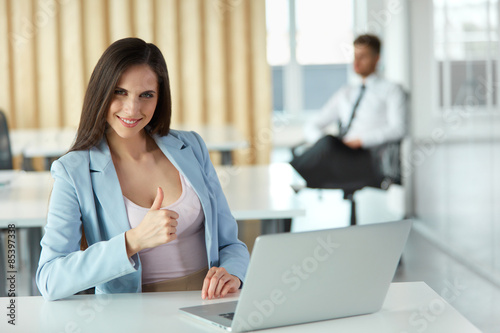 Business Woman Showing thumbs up Gesture. Business People