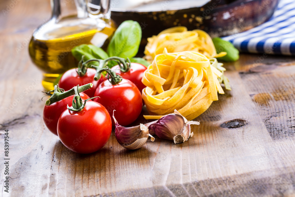 Italian and Mediterranean food ingredients on wooden backgroun Italian and Mediterranean food ingredients on wooden backgroun