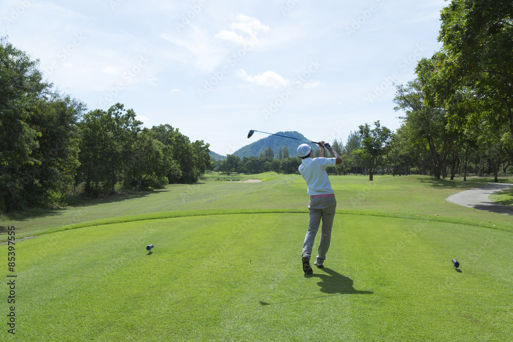 widely golf course in very nice day summer with player widely golf course in very nice day summer with player
