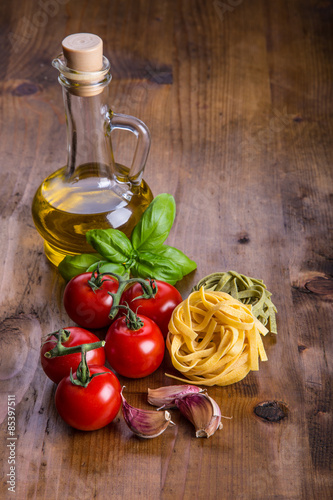 Fototapeta Naklejka Na Ścianę i Meble -  Italian and Mediterranean food ingredients on wooden backgroun 