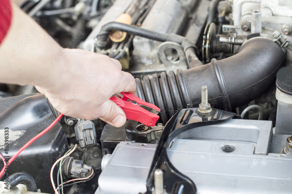 The process of connecting the charger to the the vehicle battery