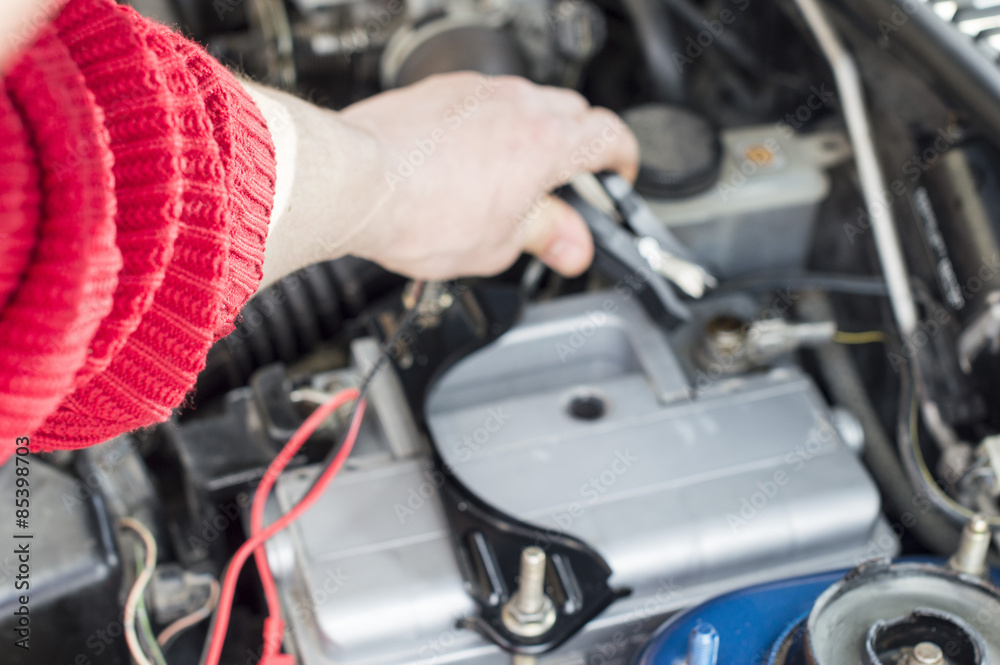 The process of connecting the charger to the the vehicle battery