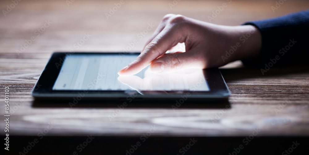 woman hand presses on screen digital tablet woman hand presses on screen digital tablet