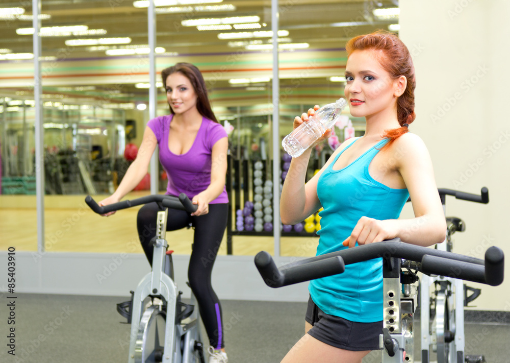 Two girls at fitness club Two girls at fitness club