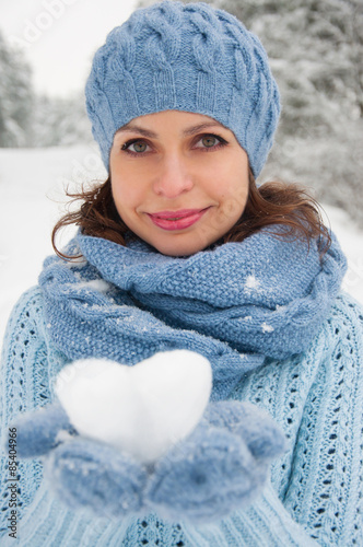 winter portrait of the beautiful young woman