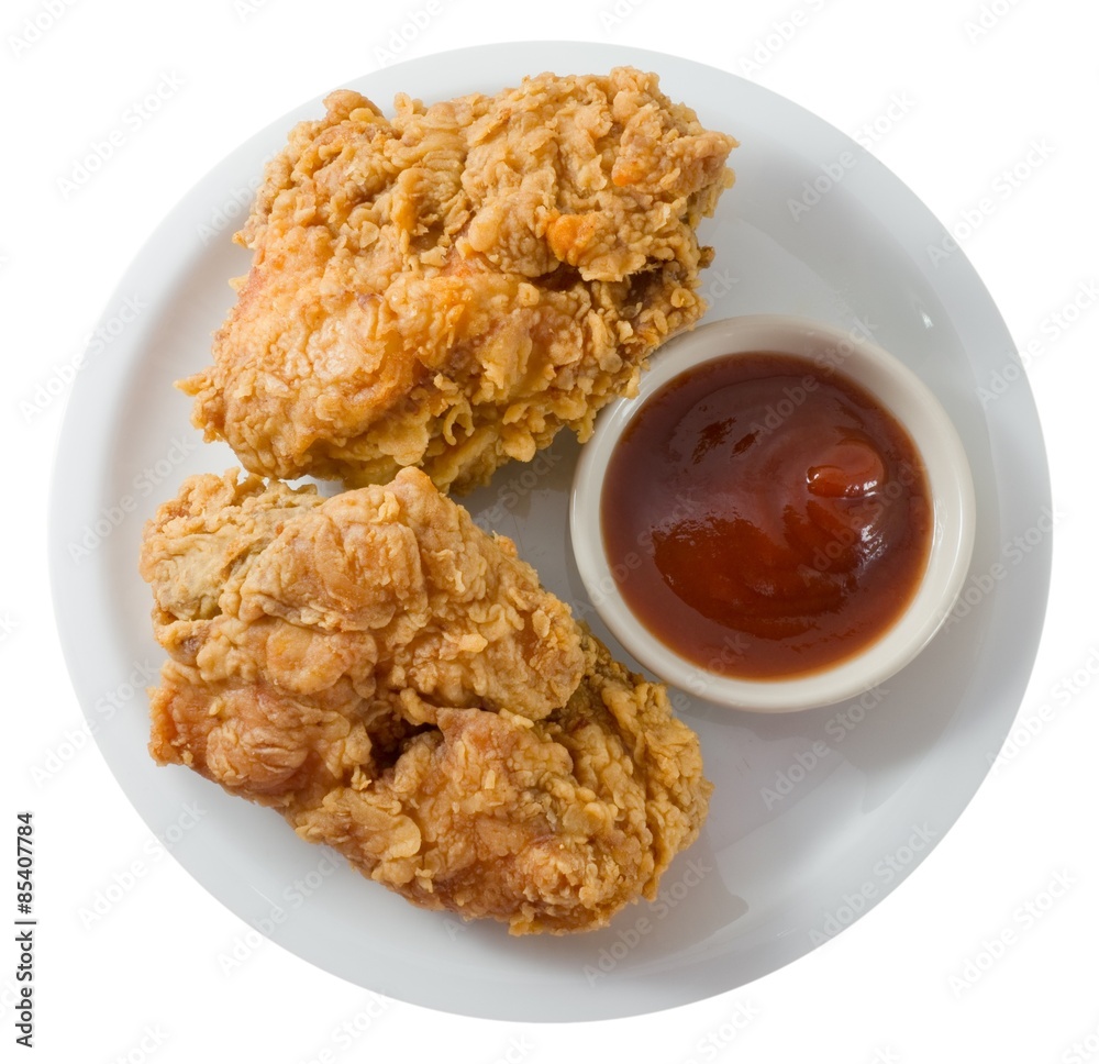 Deep Fried Chicken with Sauce on A White Dish Deep Fried Chicken with Sauce on A White Dish
