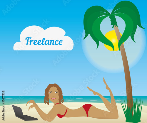 Beautiful tanned girl laying on a beach with laptop. Freelancer