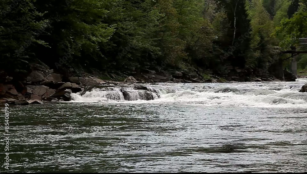 Mountain creek water flowing rapidly river cascade Mountain creek water flowing rapidly river cascade