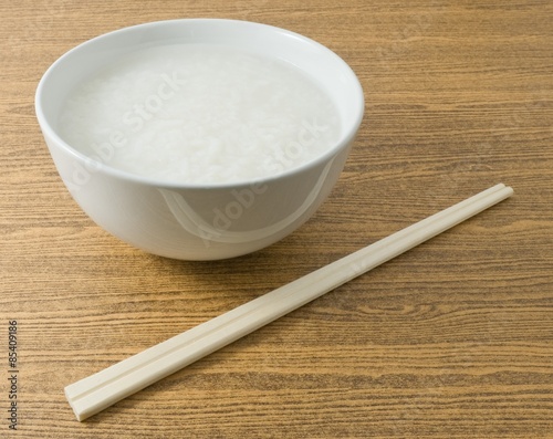 Soft Boiled Rice or Rice Porridge with Chopsticks