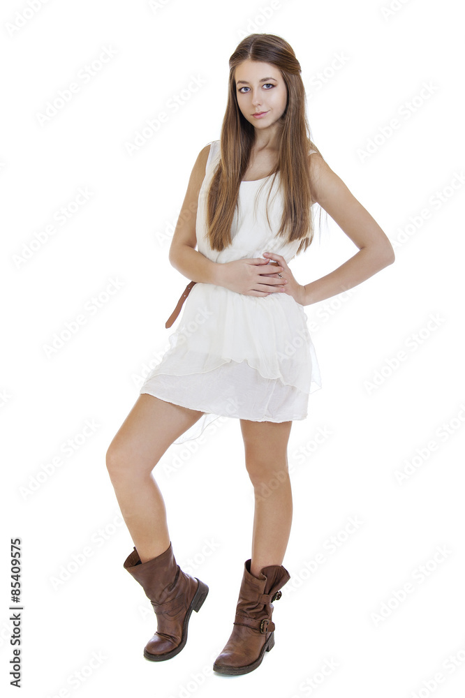 Fashion beautiful girl with modern white dress posing in studio Fashion beautiful girl with modern white dress posing in studio