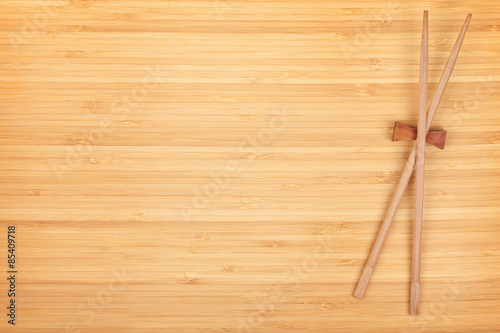 Sushi chopsticks on bamboo table