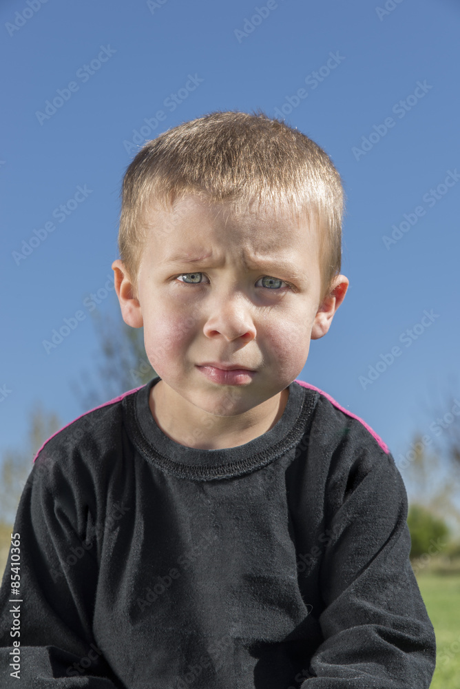 sad boy looking at camera sad boy looking at camera