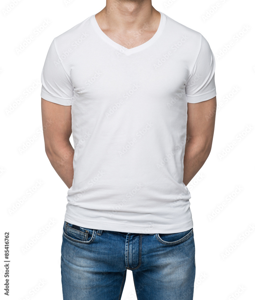 Close up of the body view of the man in a white t-shirt. Hands are crossed behind the back. Isolated on the white background. Close up of the body view of the man in a white t-shirt. Hands are crossed behind the back. Isolated on the white background.