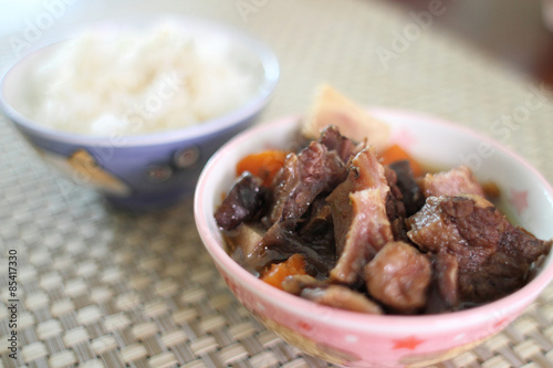 Bowl of white rice with Korean beef stew known as "kalbi jim."