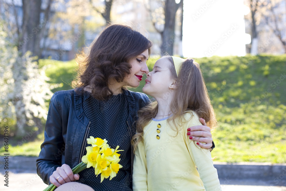 Fototapeta premium cheerful and positive mother with the daughter
