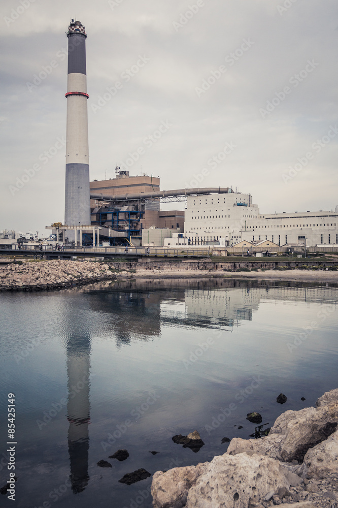 Reading power station, Tel Aviv, Israel. 
During the afternoon on a cloudy day
The power station is reflected on the Yarkon.